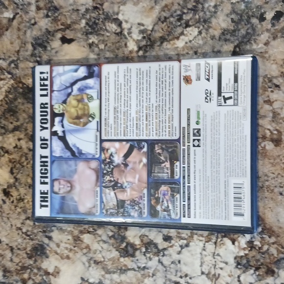 PlayStation 2 Smack Down Vs Raw 2006 - Picture 2 of 6